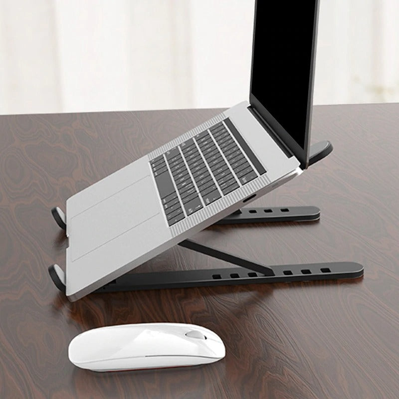 Foldable laptop stand for bed lightweight ventilate portable laptop stand with 7-Level adjustable Height for 11 – 15 Inch notebook stand ABS High Quality plastic laptop stand with aluminum center rod and non-slip silicon grip.